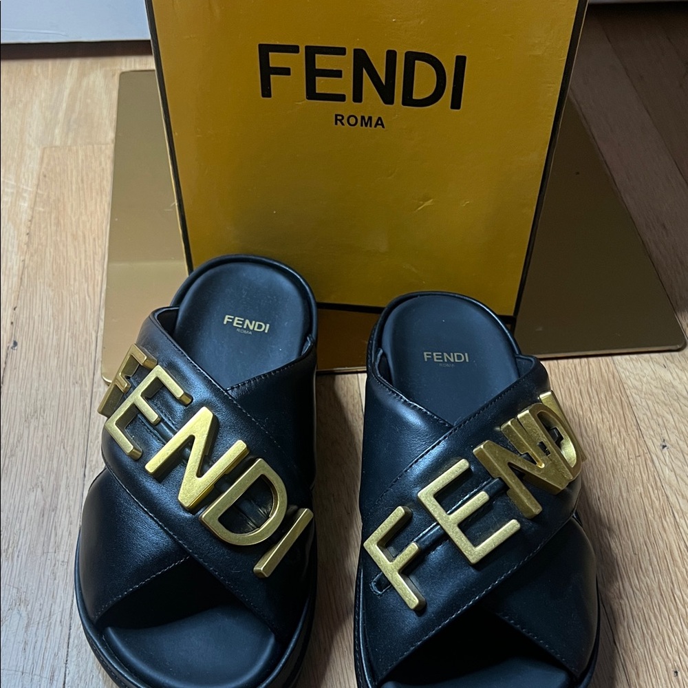 Fendi Black Slides with Gold Lettering